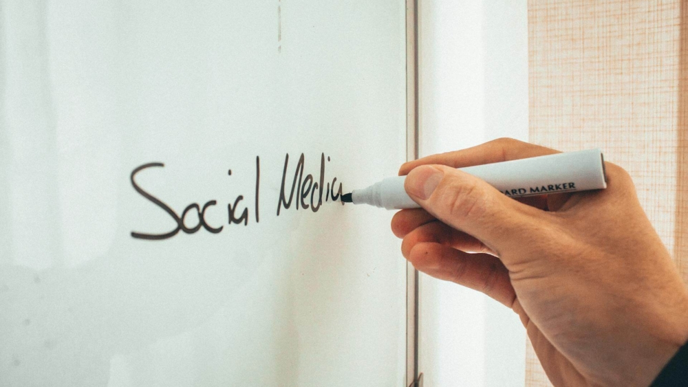 Hand writing Social Media on white board